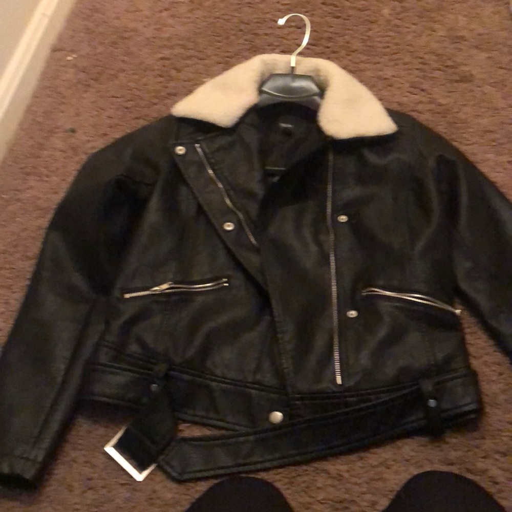 Leather jacket with fur collar